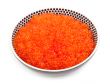 A plate full of fresh red caviar