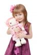 portrait of a little girl 4 years old with a plush toy