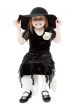 The little girl hamming in a black felt hat