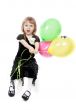 Little beautiful girl with balloons in the studio on a white bac