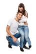 Young beautiful couple isolated on white background
