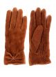 A pair of brown leather gloves
