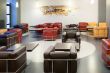 Interior of fashionable modern cafe with leather furniture