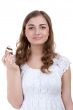young woman eating the cake