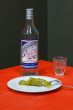 Still a bottle of vodka, snack and a glass
