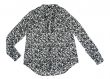 Fashionable women`s blouse in dark colors.