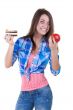 The girl picks an apple or a cake