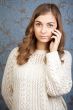 portrait of a girl with a telephone against the backdrop of a re