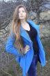 Girl in a blue coat