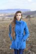 Girl in a blue coat