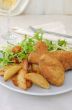 Chicken drumsticks with breadcrumbs with potatoes and salad