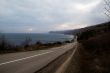 Road running along the sea