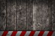 wooden background with warning bar