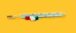 thermometer with pill