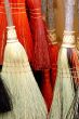 Colorful brooms.
