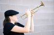 Female jazz trumpet player.