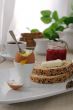 Breakfast with soft-boiled egg and slices of oatmeal bread