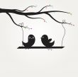 Cute greetings card with birds on a swing