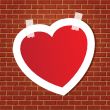 Heart on the brick wall
