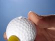 Hand and Golf Ball Closeup