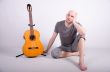 Nice bald guy with a guitar