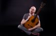 Nice bald guy with a guitar