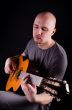 Nice bald guy with a guitar