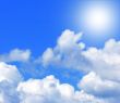 Sun in a blue cloudy sky