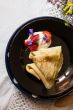 Pancakes, strawberries and cream