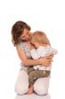 Young boy sitting on mother lap
