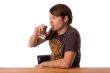 Man drinking water in a glass