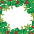 Christmas background with holly berry leaves on dark green background