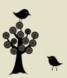 Cute greetings card with birds on a swing