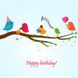 Cute greetings card with birds on a swing