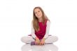 Young girl making faces on the floor
