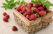 Basket full of strawberries on the table