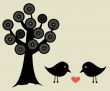 Cute greetings card with birds on a swing