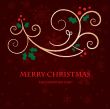 Christmas background with holly berry leaves on dark green background