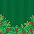 Christmas background with holly berry leaves on dark green background