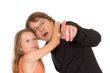 Father showing something to his daughter