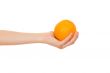 Orange in a hand