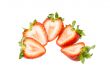 Fresh strawberry slice isolated on white background