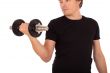 Man doing exercise with a steel dumbbell