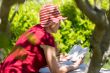 Mature woman reading book