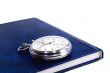 Stopwatch and the notebook on a white background