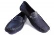 Black leather loafers on a white background.