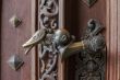 The latch on the gate of the castle Hluboka nad Vltavou