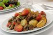  Fried mushrooms with sliced tomatoes and potatoes