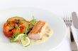 Fish fillet, sauce and vegetables