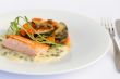 Fish fillet, sauce and vegetables
